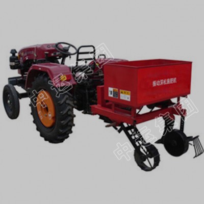 Tractor type ditching fertilizer machine